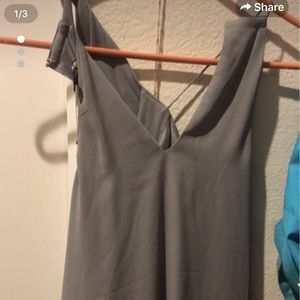 Express gray tunic. Unique sleeveless style.